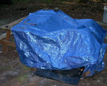 Tarp covering tent set up - www.Motorcycles123.com