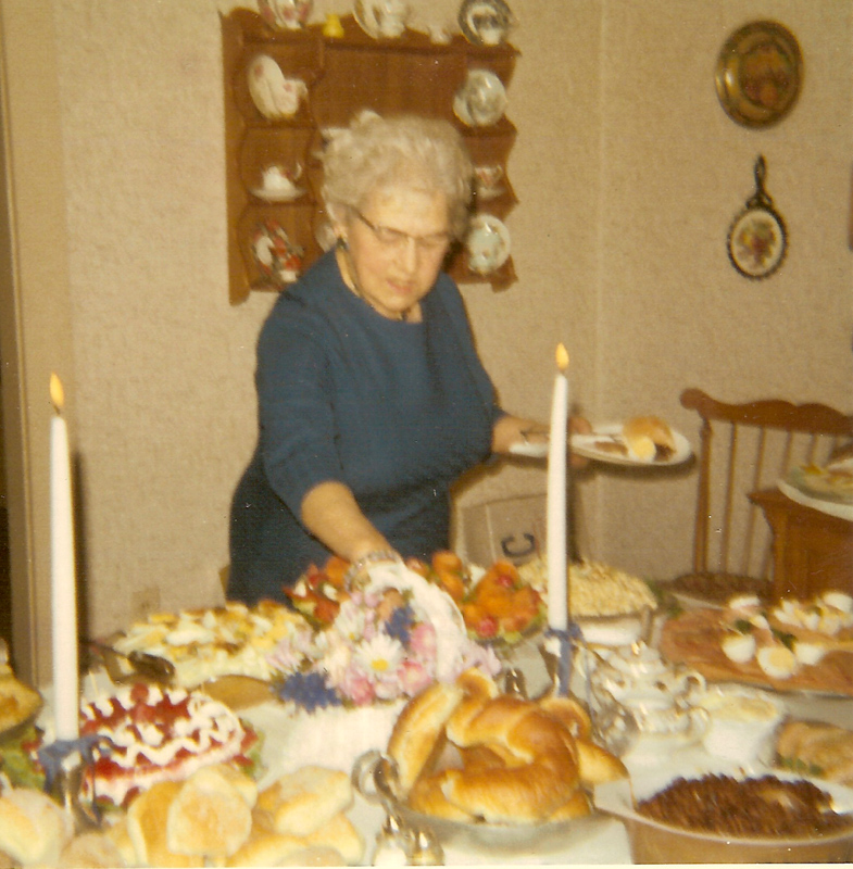 ALice ( Audette ) Sirois setting up a party table